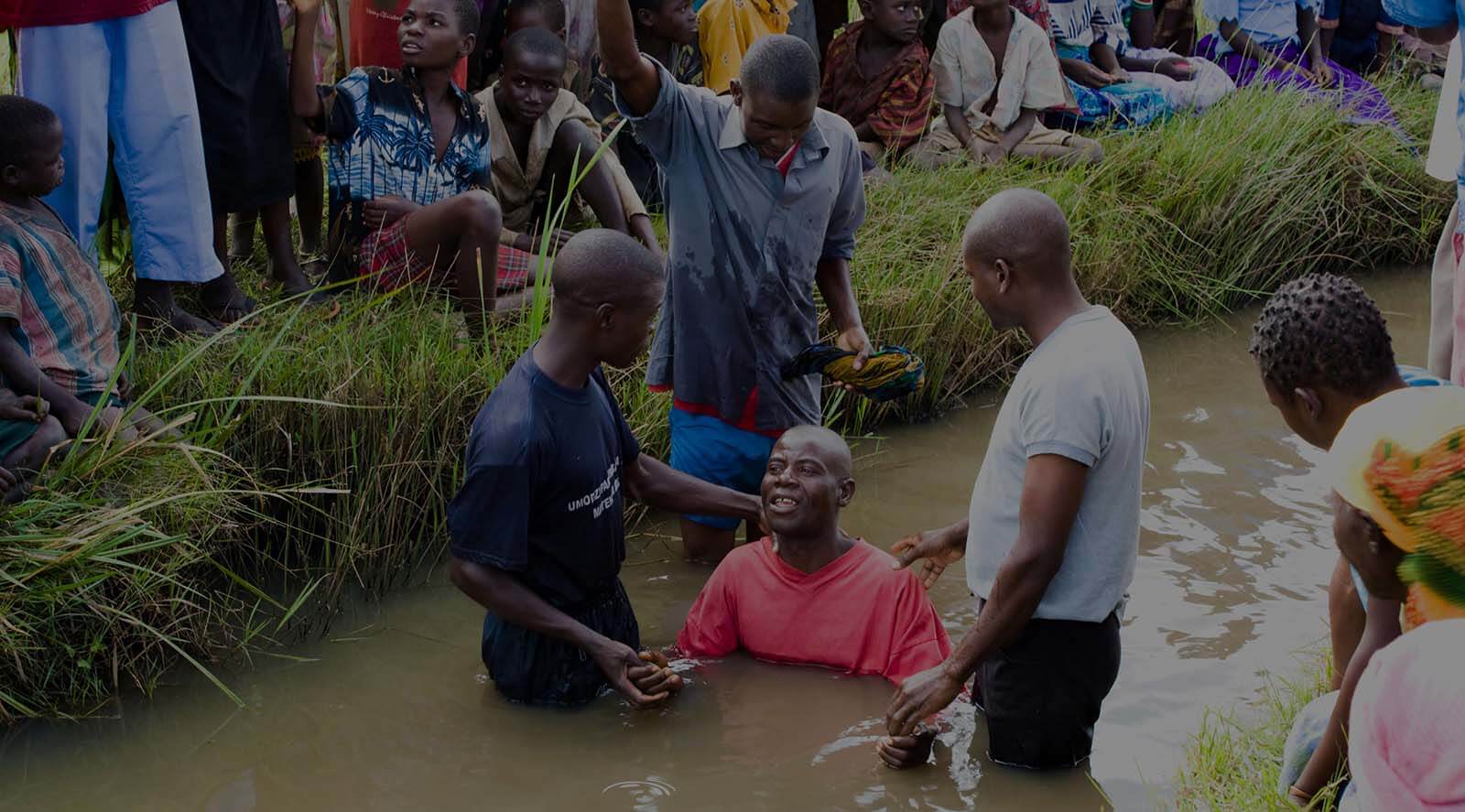 African baptism in river
